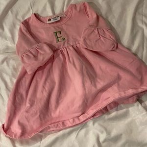 Embroidered “E” dress